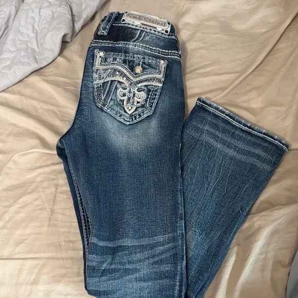 Rock Revival Blue Boot Cut Jeans with Embellished Pockets